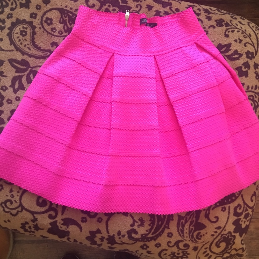 Aline pink Francesca’s shirt.